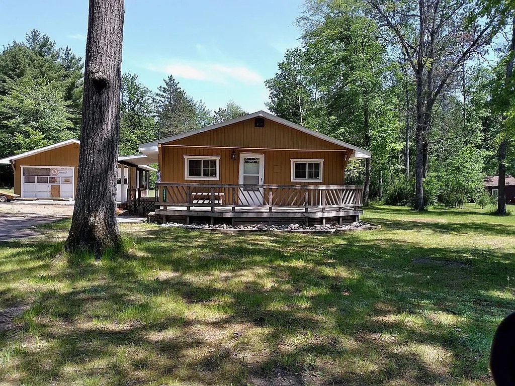 Northern Michigan’s Best Kept Secret: A Remodeled Lewiston Oasis with Acreage and Two Garages