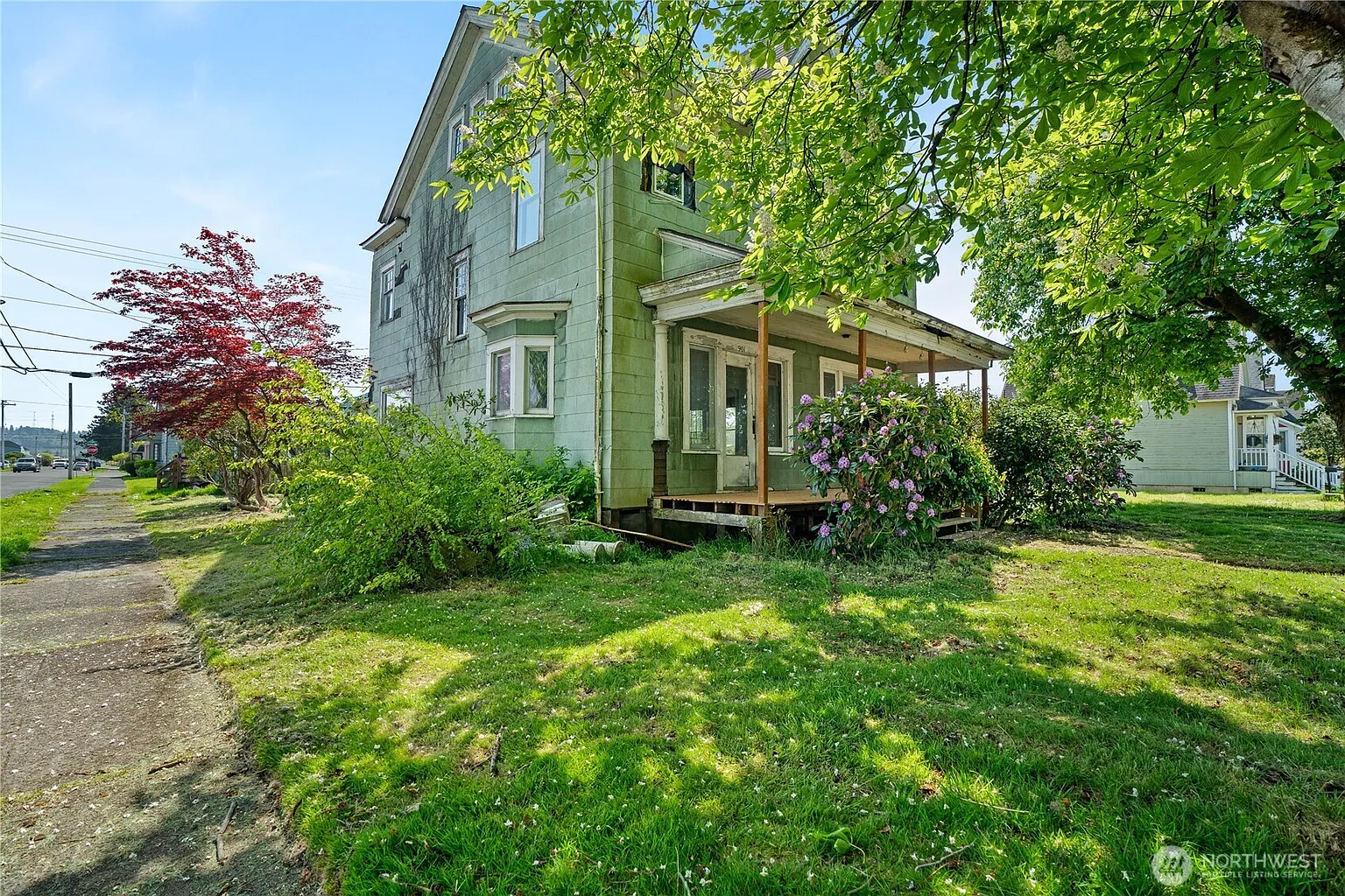 Historic Character Meets Unlimited Potential: Grand Restoration Opportunity Near the Waterfront