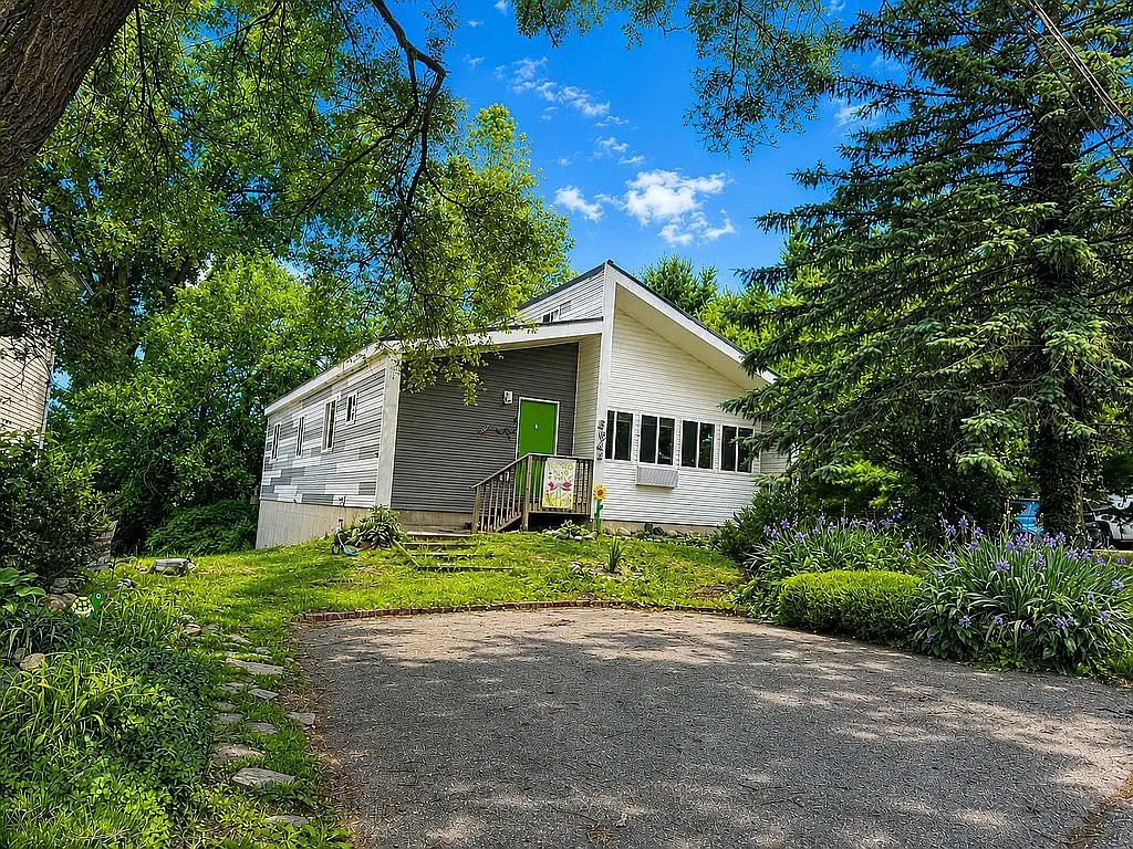 Lakefront Living Reimagined: A Custom Oasis in Bath, Michigan