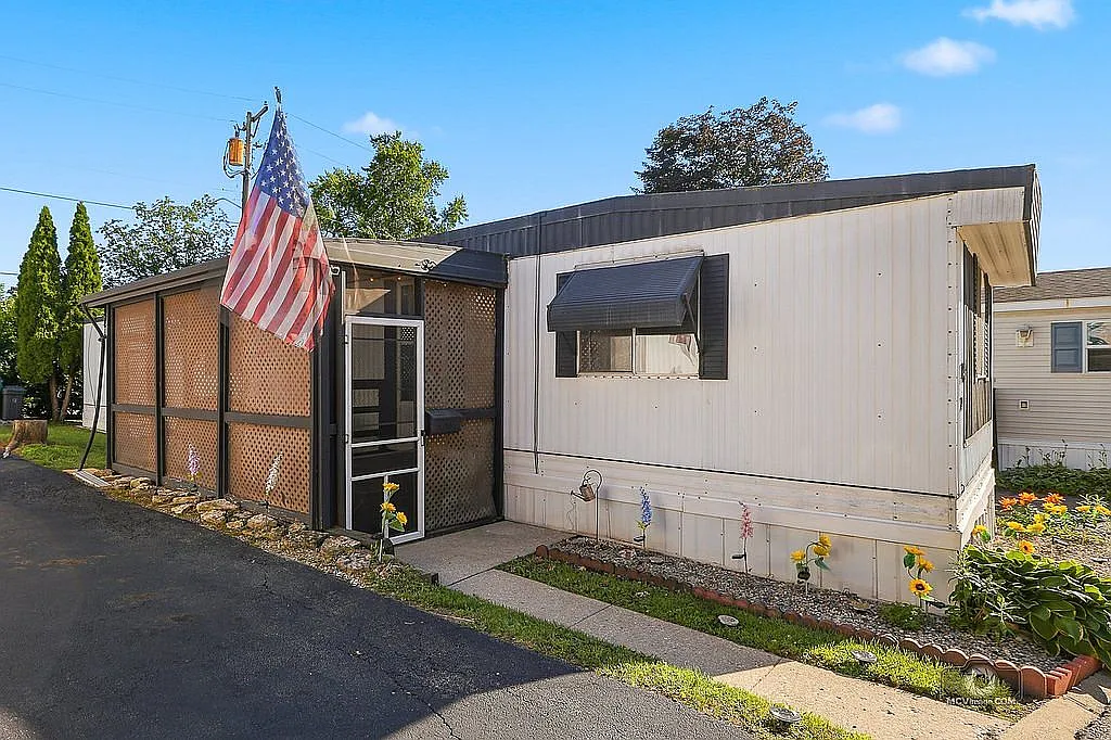 Discover Riverfront Living in This Charming Batavia Manufactured Home