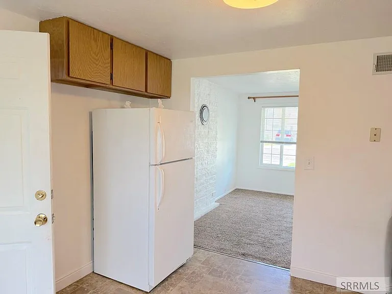 Kitchen area and adjoining room