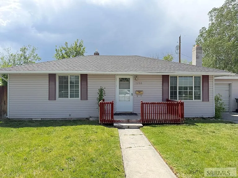Second listing photo showing the front of the Idaho Falls home
