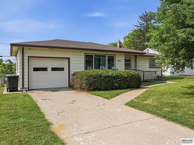 This $250K Omaha Ranch Is Move-In Ready Upstairs—and Full of Potential Below