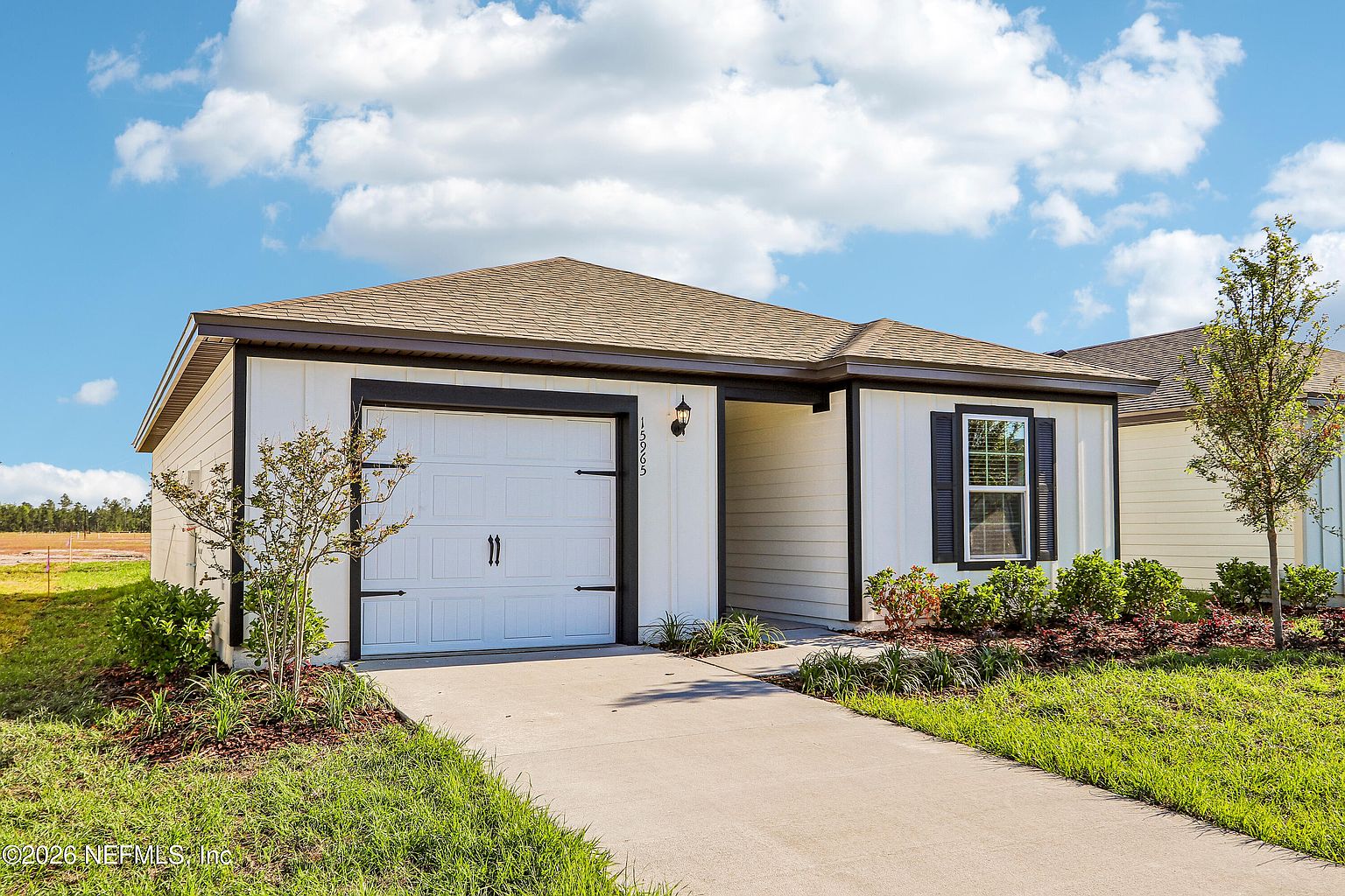 Angled front exterior of the Jacksonville home with attached garage