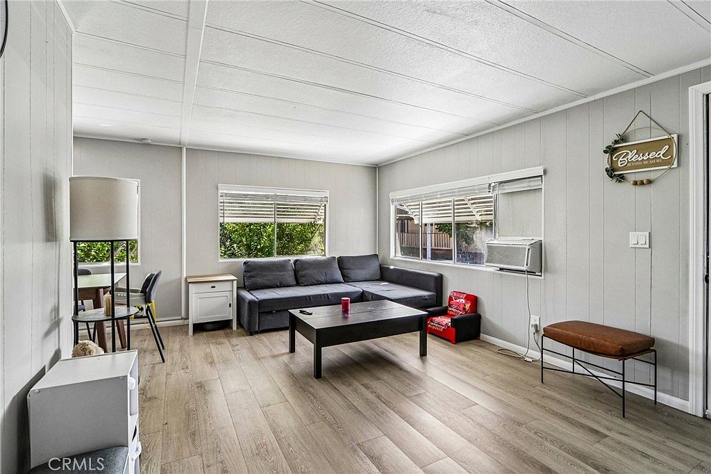 Bright living room with wood-look flooring